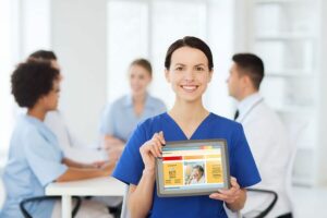a nurse holds a tablet with the independa web app